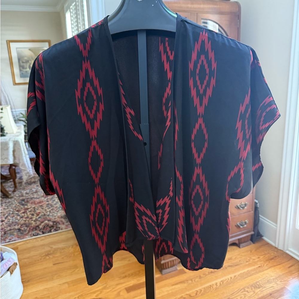 Short poncho-like overshirt in excellent condition size S